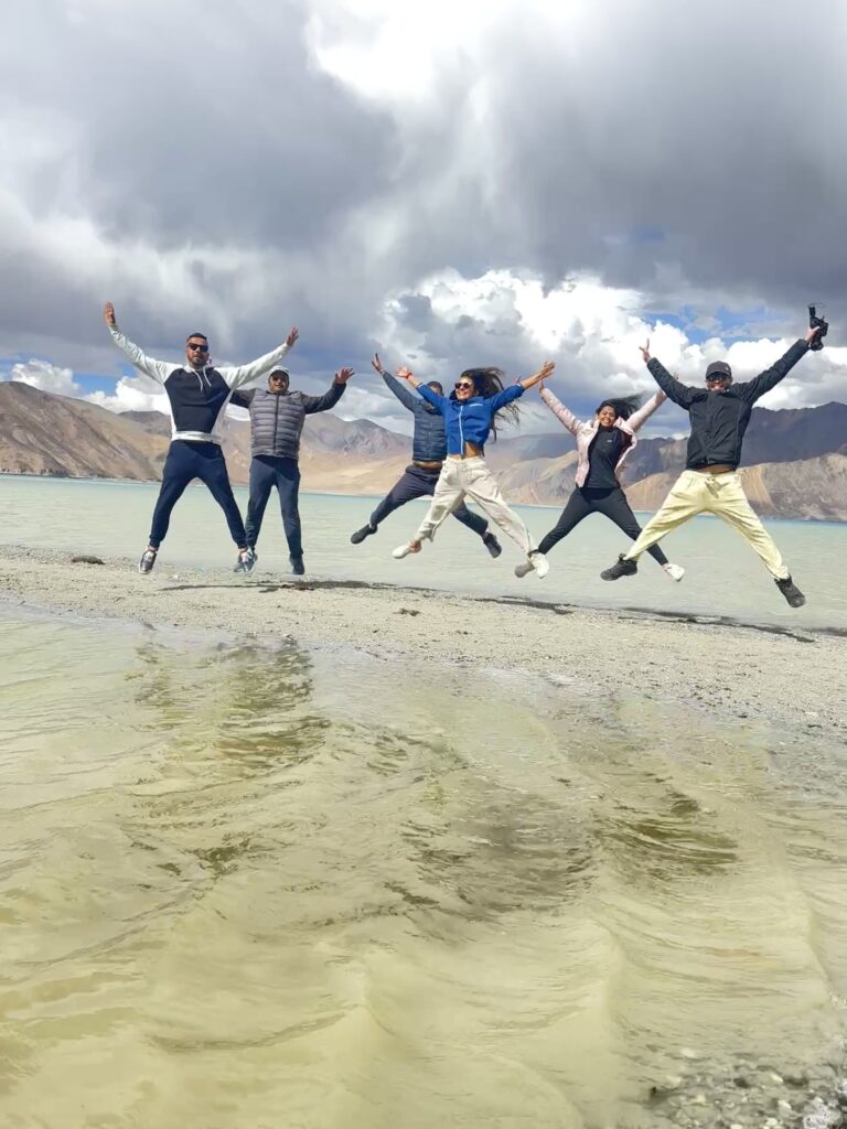Jumping at Pangong Lake while leaving during Classical Hatha Yoga Retreat in Ladakh in July 2025