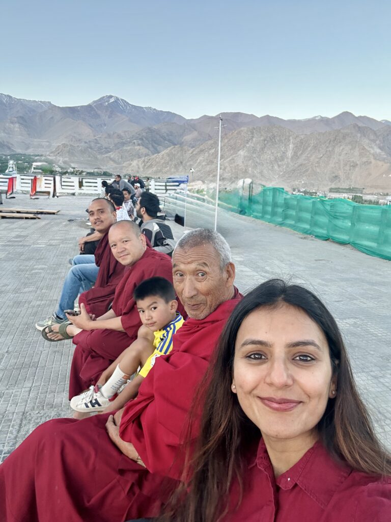 Sitting with Buddhist monks, Shanti Stupa, Classical Hatha Yoga Retreat, Leh, Ladakh